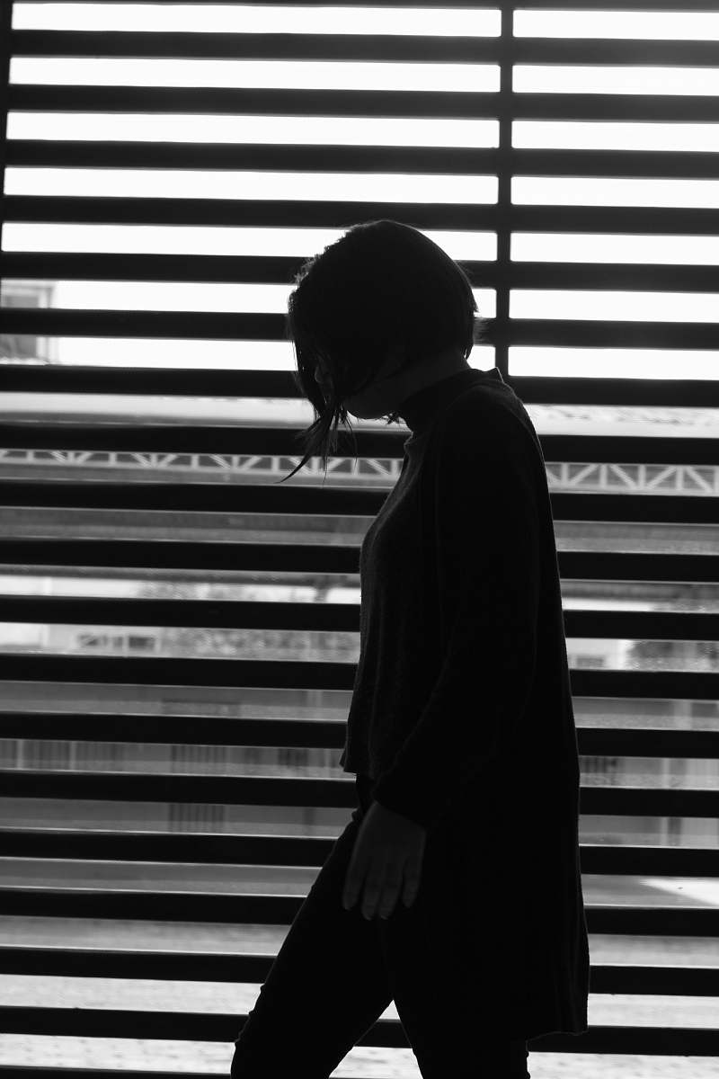 home decor woman standing near the window person